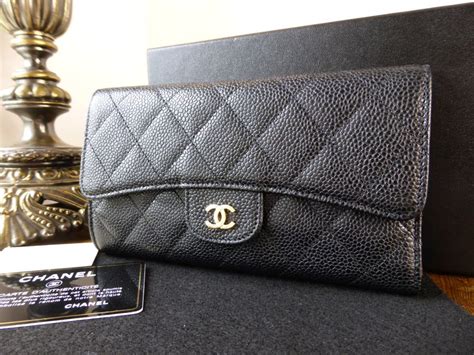 Chanel Black Quilted Caviar Classic Long Flap Wallet Gold .